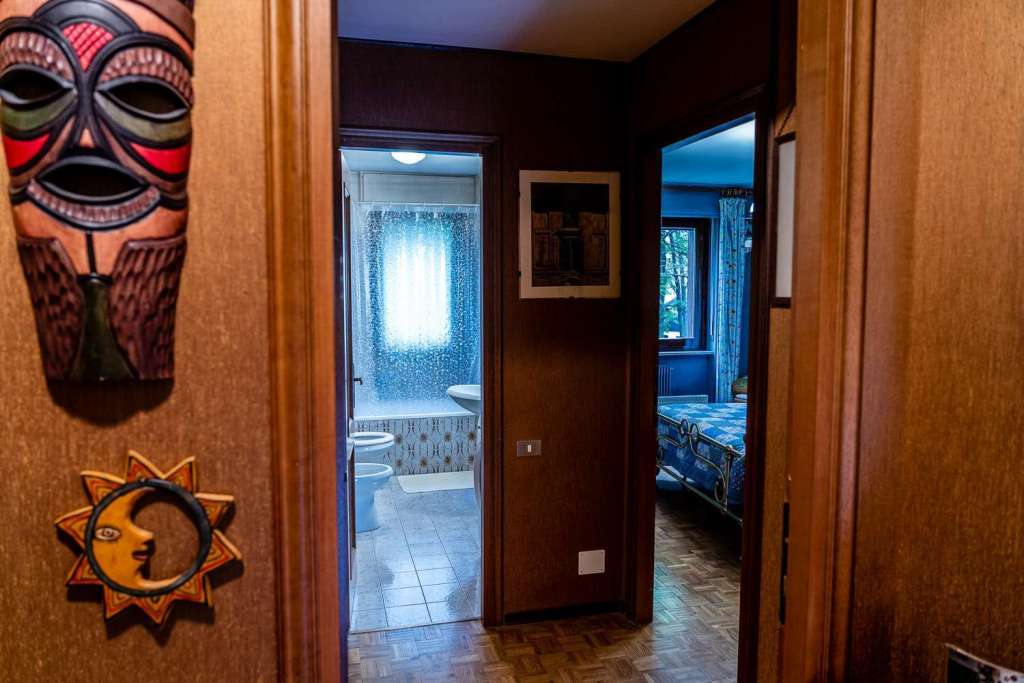 Italian Homes vs American Homes Double Doors to Bathroom